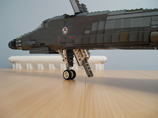 Illustration for article titled Giant LEGO B-1B Bomber Escorted by Fighters, Hawkeye Aircraft